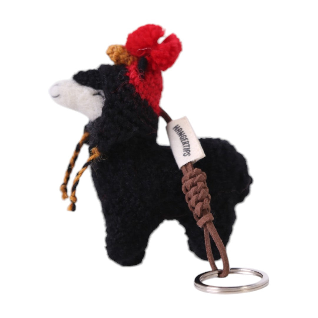 Llavero alpaca Kusi con gorro de gallito de las rocas
